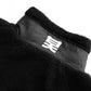 Black fleece jacket with a brand logo on a white background